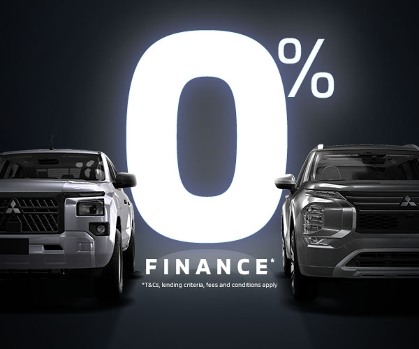 A glowing white 0% finance behind two front facing Mitsubishi cars